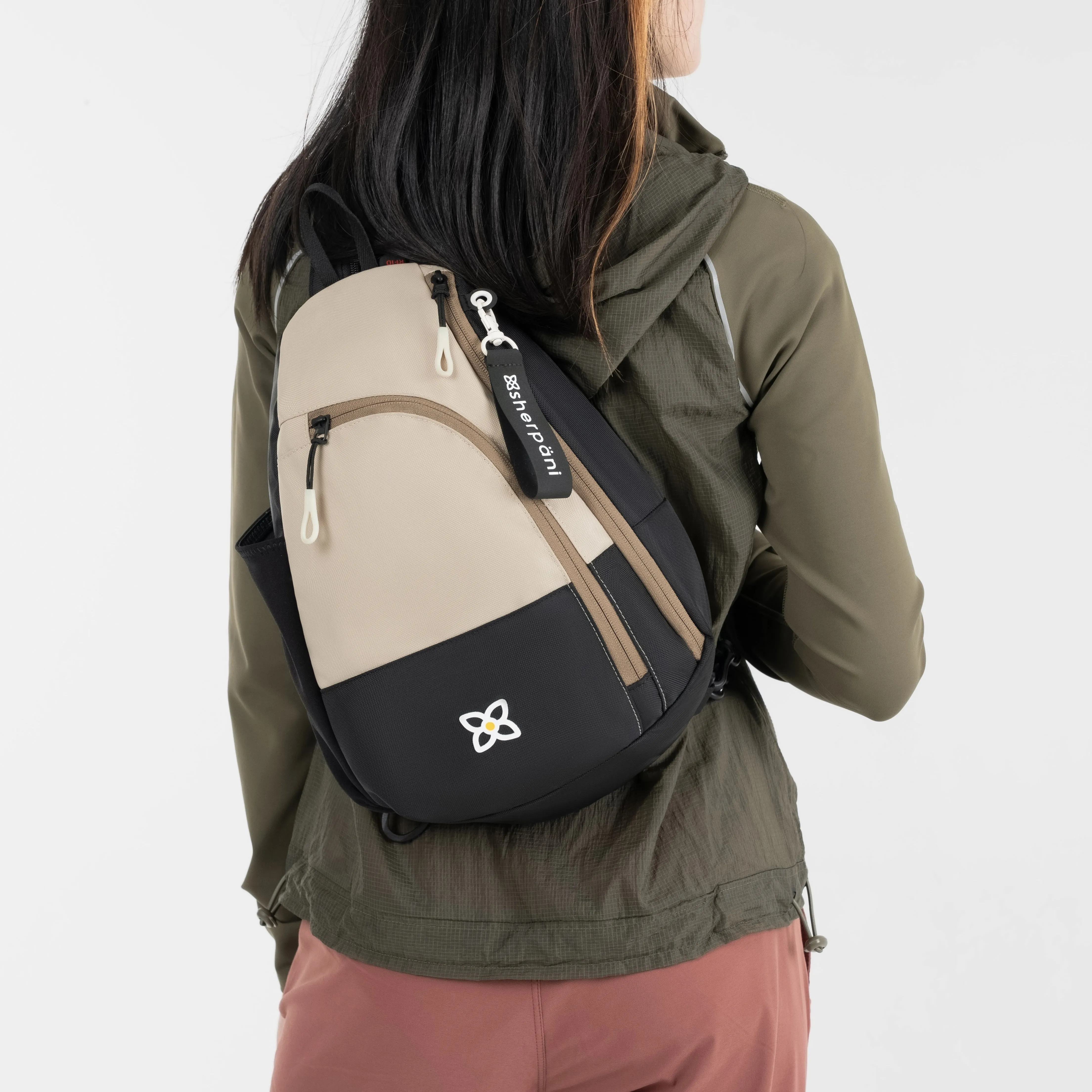 Sherpani Wayfarer Convertible Sling/Backpack con leche